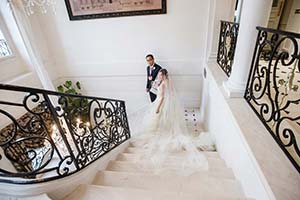 Bride walking down stairs