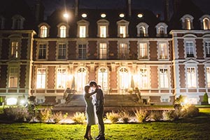 Wedding couple in front of venue