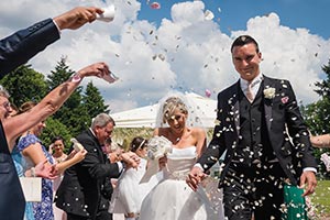 Bride and groom with confetti